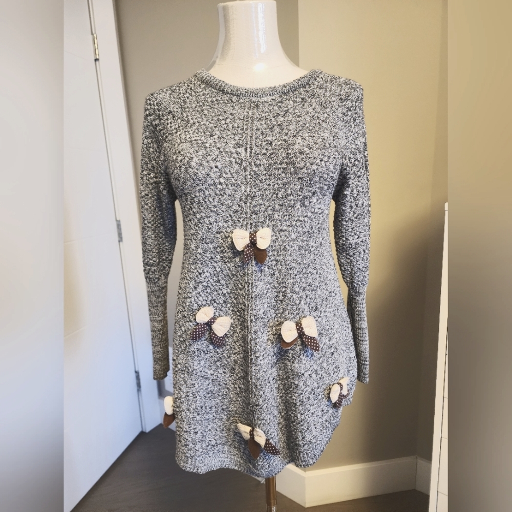 Knitted sweater dress or shirt with bows